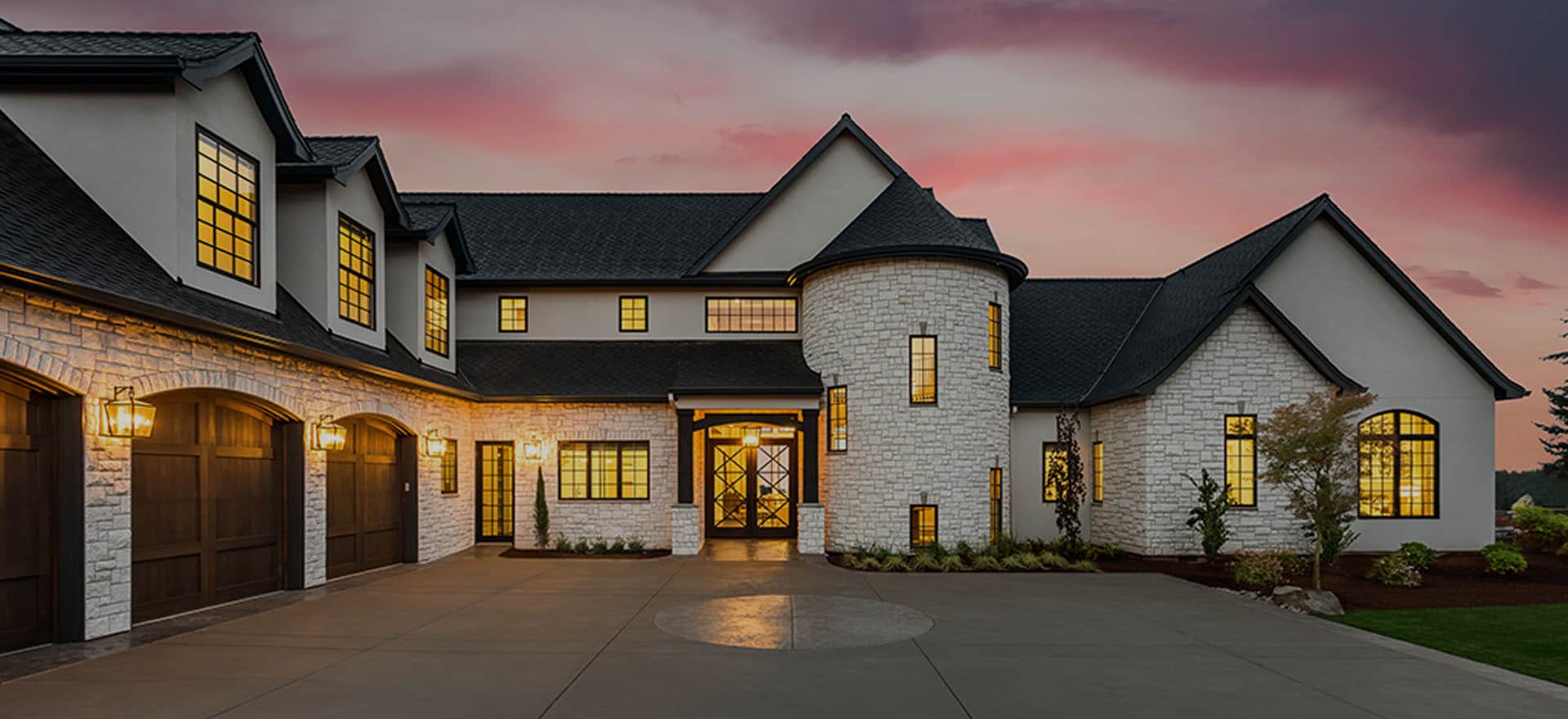 Light tan fancy house with pink sky